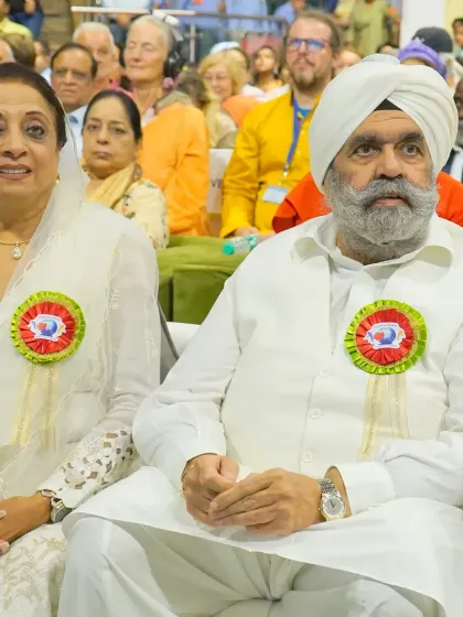 Capturing key moments of your event is crucial. We work with photographers to ensure all important guests and interactions are documented, as seen here at the Darshan Academy's annual day.