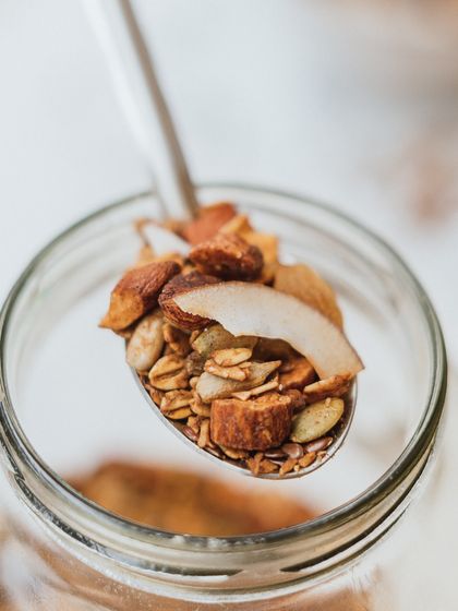 A spoonful of our crunchy, wholesome granola. It’s perfect on its own, with our plant-based milk, or paired with a cacao hemp protein shake for a powerful start to your day.