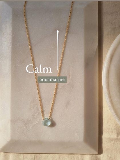 The 'vādhīr' Aquamarine heart-shaped drop pendant, a stone of soothing, courage, and calm.