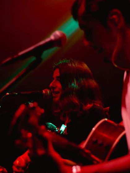 The stage lights creating a dramatic effect during our trio performance.