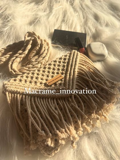 My beige macrame sling bag styled with a few daily essentials. It's the perfect size to carry what you need without being bulky.