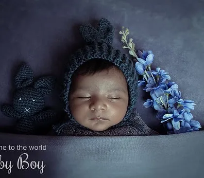 Your final images can be customized with text to create beautiful birth announcements. This example shows a "Welcome to the world Baby Boy" design.