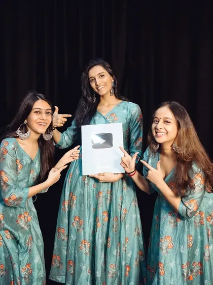 The three of us celebrating a huge milestone: our YouTube Silver Creator Award! This represents our amazing community of over 100,000 subscribers, and we're so grateful for every single member of our OSD Fam.