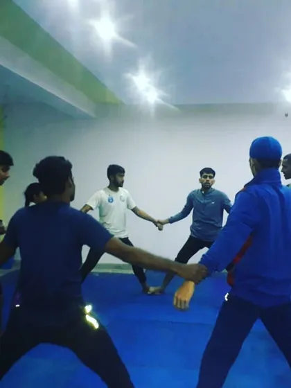 A look at our daily stretching routine from another angle. Consistent practice like this is key to developing the physical attributes of a serious karateka.