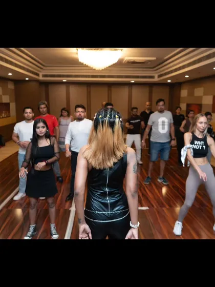 A view from the back as I lead a workshop. It's a powerful feeling to see a room full of dancers moving in sync, united by the rhythm.