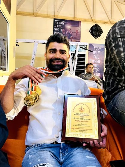 It is an honor to be recognized for my contributions to the sport. Holding these medals and the plaque from a competition reminds me of the dedication it takes from both athletes and coaches.