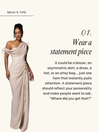 The first tip to standing out is to wear a statement piece. It could be an asymmetric dress like this one, a bold blazer, or an artsy bag that reflects your personality and starts conversations.