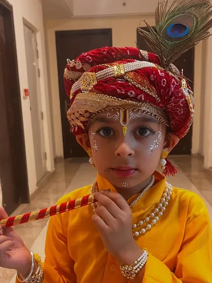 This is my little Kanha, my own son. Painting his face for Janmashtami was a truly special moment for me as a mom and an artist. It’s a blessing to share my craft with my family and create these beautiful memories.