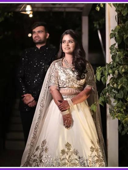 A beautiful shot of the couple on their Sangeet night, ready to make their grand entrance. We capture the anticipation and excitement.