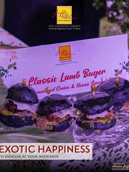 Exotic happiness to indulge in at your weddings. Our Classic Lamb Burgers, served in charcoal buns with caramelized onions, offer a gourmet twist on a beloved comfort food.