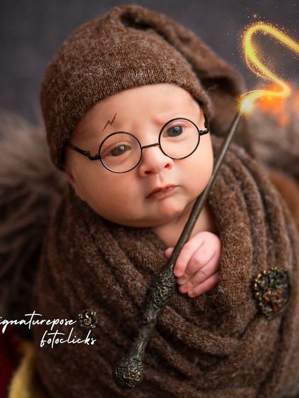 This little wizard is ready to cast his first spell. The intense look and glowing wand make this a powerful and captivating portrait from our Harry Potter series.