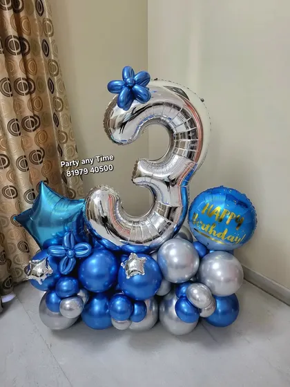 A 3rd birthday number bouquet in blue and silver.