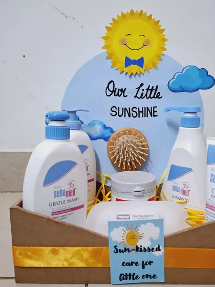 I believe in using products I trust, which is why I often include brands like Sebamed in my skincare hampers. This 'Our Little Sunshine' themed gift includes a full set of gentle wash, shampoo, and cream, perfect for a newborn's sensitive skin.
