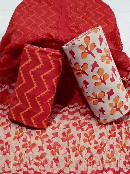 This vibrant red and orange block print set is perfect for adding a pop of color to your summer wardrobe.