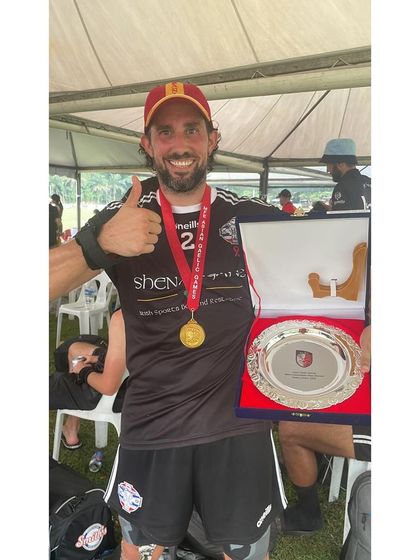 From our clinic to the winner's podium. We are thrilled to see our client, an ACL reconstruction patient, holding his winner's trophy after a tournament victory with the Thailand GAA team. This is the ultimate goal of our rehabilitation programs.