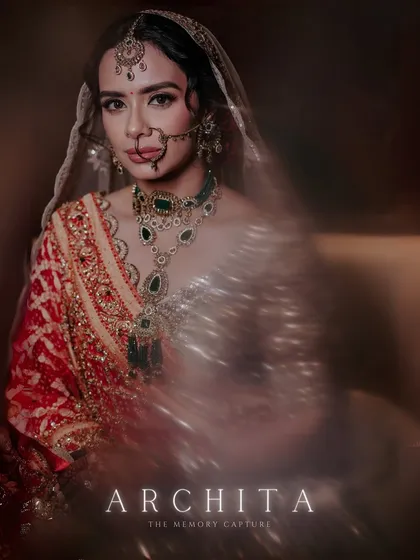 A bridal portrait is a work of art. Using a slow shutter technique, we created this ethereal, motion-filled portrait of Archita, capturing her elegance and the dreamlike quality of her wedding day.