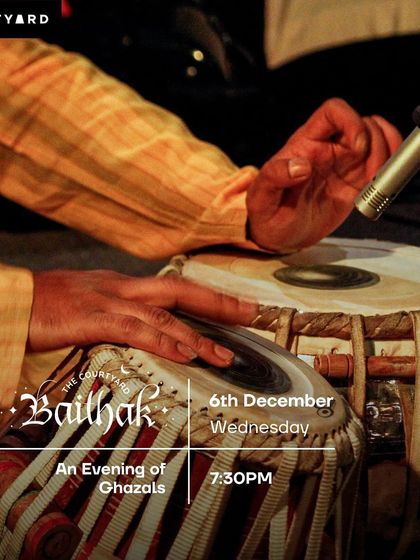 A poster detail for a ghazal evening at the Courtyard Baithak.