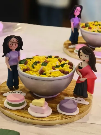 This cake was for a comedy event, inspired by an inside joke about "Poha." The entire bowl of poha is actually a white chocolate bowl filled with mango mousse and pistachio sponge. The realistic peanuts and curry leaves even fooled the judges!