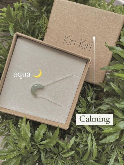 This is my Aquamarine Luna Pendant in its gift box. It's a perfect piece for anyone seeking calm and peaceful vibrations.