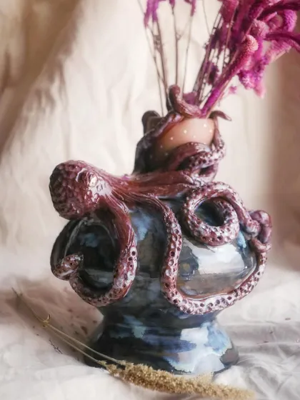 I get very attached to some pieces, and this octopus vase is one of them. I love the challenge of sculpting something so detailed and full of life onto a wheel-thrown form.