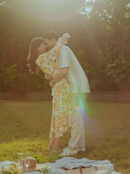 A sun-drenched afternoon, a romantic picnic, and a love that glows. We love capturing these soft, golden-hour moments that feel warm and intimate, letting the natural light paint a beautiful story.