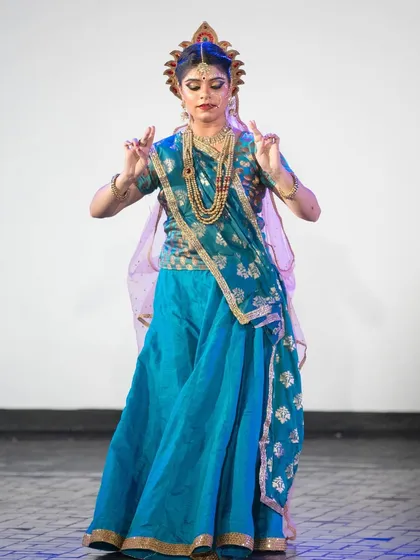 As Radha, every gesture is filled with devotion. Here, the hand mudras and expression convey a specific emotion from the narrative of her divine love story with Krishna.