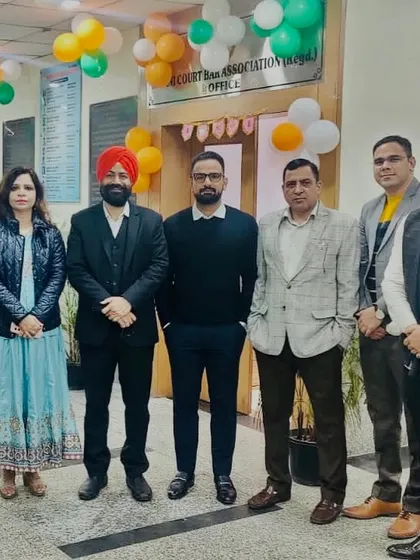 Standing with colleagues outside the Rohini Court Bar Association office during Republic Day celebrations.