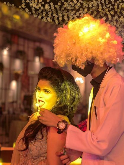 A guest enjoying one of our 'fancy services'. The Dr. Gulati character provides a fun and interactive way to serve drinks, ensuring a memorable experience.