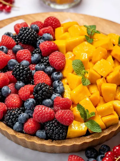 Can’t decide between mango and berries? You don’t have to. My half-and-half Signature Chocolate Pudding Tart brings you the best of both worlds, with juicy Alphonso mangoes on one side and a mix of fresh berries on the other.
