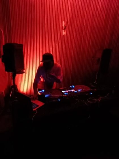 Me at the controls during a fun night of 90's hip hop. It's nights like these that remind me why I fell in love with DJing in the first place.