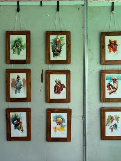 A collection of photos from various art exhibitions and fairs I've participated in, including the National Exhibition of Art and the Jaipur Kala Mela. It's an honor to have my work displayed in these prestigious venues.