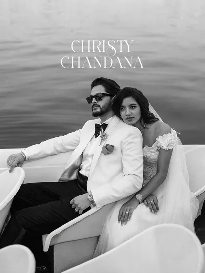 A moment of quiet elegance on the water. This black and white portrait of Christy and Chandana from their boat photoshoot has a classic, cinematic quality, capturing their sophisticated style.