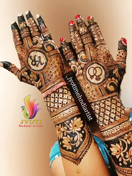 It's all in the details. This full bridal design incorporates the couple's initials and engagement rings, making the mehndi truly personal. I combine these custom elements with traditional patterns and lotus motifs for a complete and meaningful look.