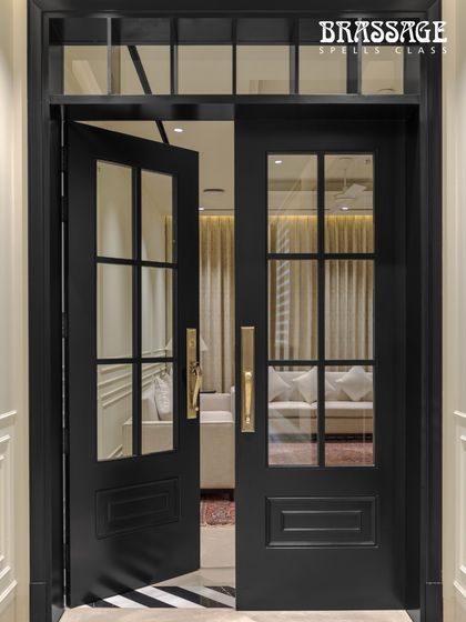 The Emperor Entrance Handle at the Shahtoot Marg residence, viewed from the interior hallway. The hardware provides a consistent element of luxury, visible from both inside and out.