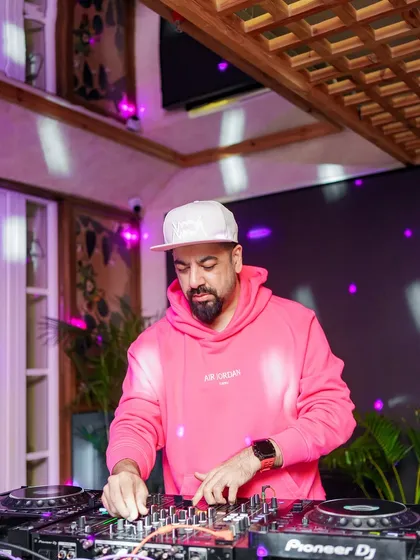 On the decks at Monkey Bar, ready to drop another classic.