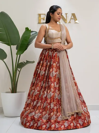 Bloom in elegance with this tulip flower georgette printed lehenga. I paired the floral skirt with a stunning thunder grey raw silk blouse, fully embroidered with gold zardozi for a perfect festive look.