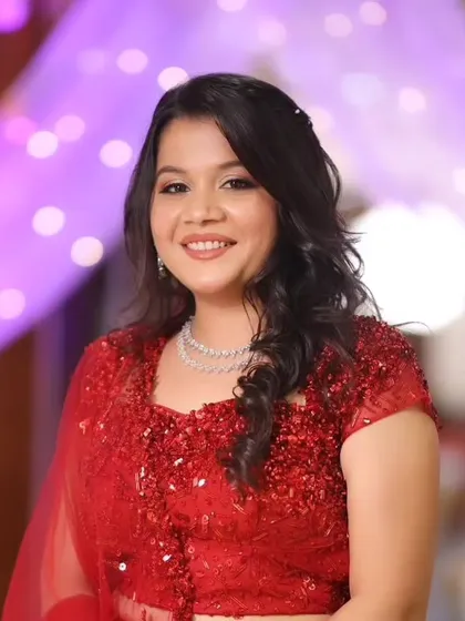 Simplicity meets sparkle. This look features a classic red sequin outfit paired with a minimal yet glowing makeup style.