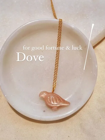 A closer look at my peach moonstone 'dóve' pendant. It's a beautiful charm for good fortune and luck.