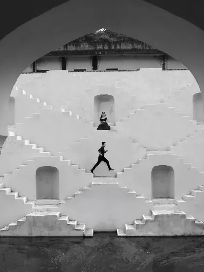 A pre-wedding shoot is a chance to tell a story before the story begins. Using the incredible architecture of Jaipur's stepwells, I create frames that are both art and narrative, capturing the couple's dynamic in a setting that is as unique as their love.