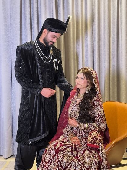 A beautiful couple portrait from the Walima. The bride's makeup is designed to look stunning both in person and in photographs.