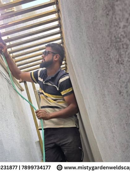 Expert welding in progress on a safety grill installation. I use high-quality welding techniques to ensure every joint is strong and secure, providing reliable safety for your home.