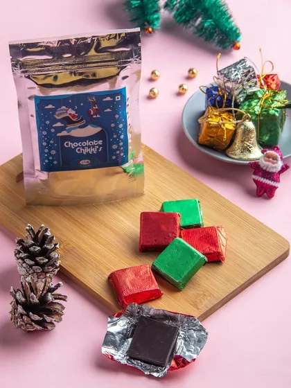 Our special Christmas Chocolate Chikkis, wrapped in festive red and green foil. A crunchy, sweet, and modern addition to your holiday sweets.