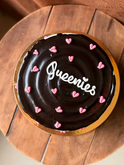 A cake for all the "Queenies" out there. This chocolate drip cake with pink hearts was made for Women's Day.