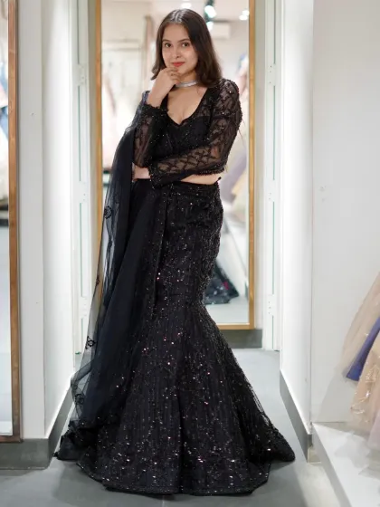 Stitched with sass and a hint of main character energy. This black sequined mermaid lehenga is designed to make you feel unstoppable.