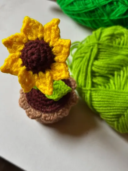 Say it with sunshine! This handmade crochet sunflower pot is the perfect everlasting gift for someone special.