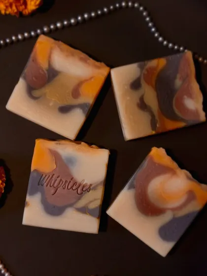 The beautiful, artistic swirls of our Noor Santhal soap. Each bar is unique, colored with Rose clay and Fullers earth for a truly artisanal touch.