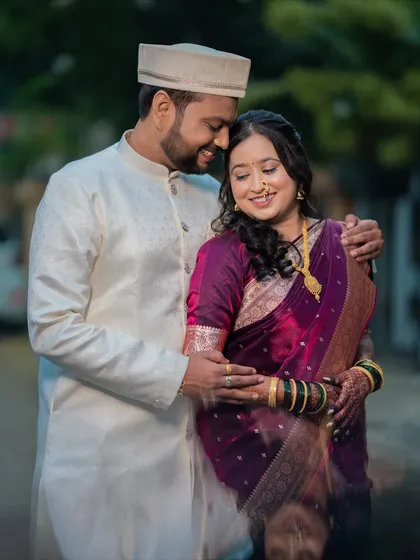 A tender moment between Prachi and Ketan during their outdoor engagement portrait session. The soft, natural light enhances the warmth and intimacy of the photograph.