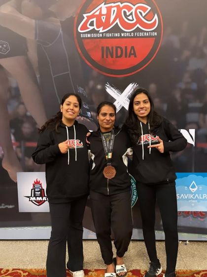 Teammates supporting each other at the ADCC Nationals. Our women's team is strong and growing, pushing each other to new heights.
