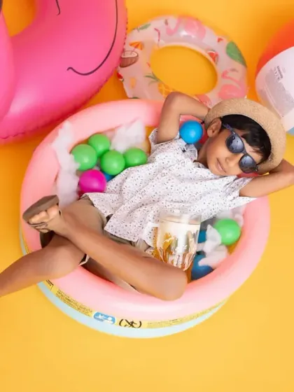 This little guy is the king of cool, relaxing in his own mini pool. The summer theme is perfect for capturing fun and playful attitudes.