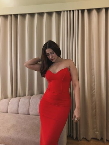 A stunning strapless red bodycon dress, perfect for making a bold statement.